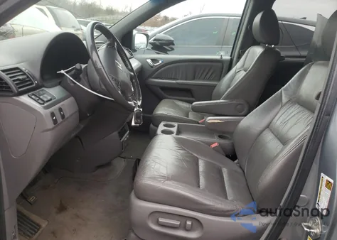 2010 Honda Odyssey Ex-L z USA, uszkodzony, nr VIN 5FNRL3H74AB098938